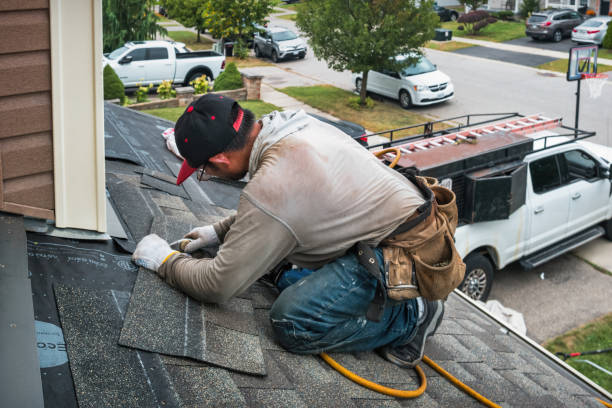 Professional Roofing technician working in Washington, NC
